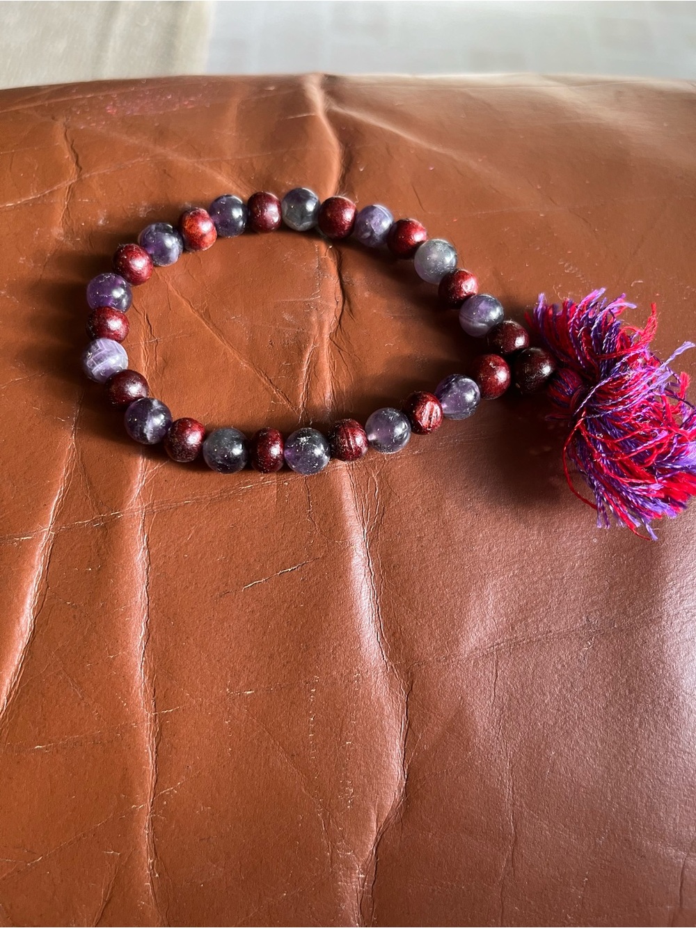 Handmade Purple & Burgundy Beaded Bracelet with Tassel